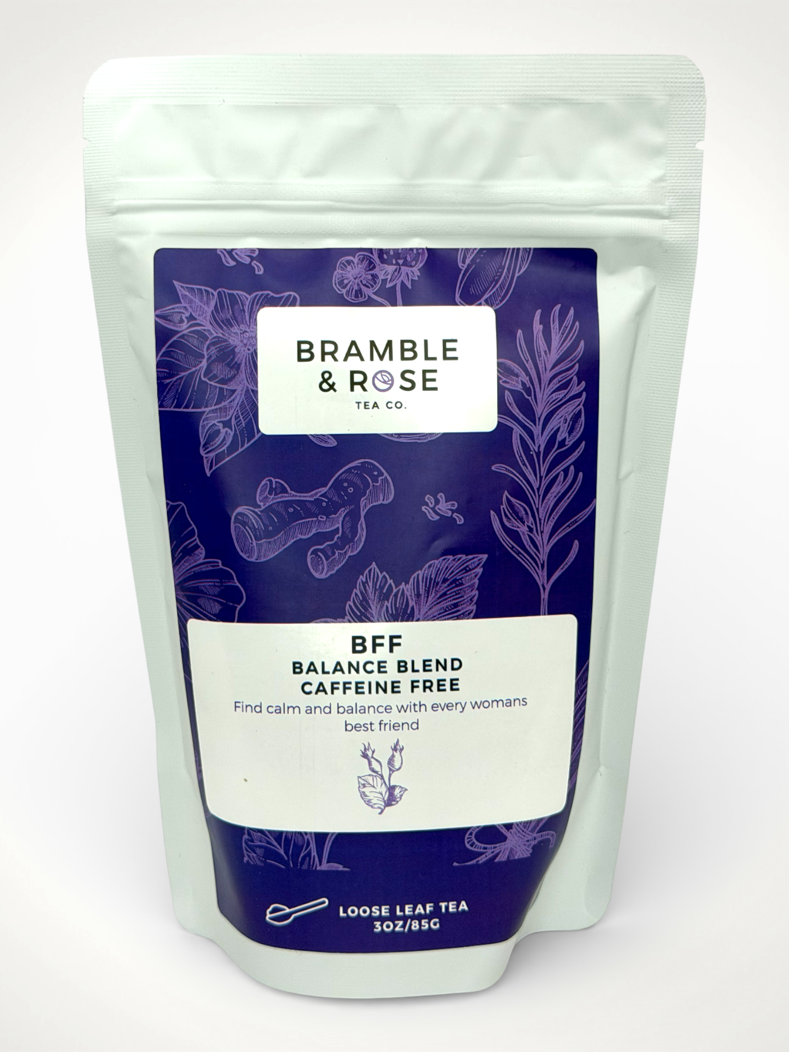 White pouch of Bramble & Rose Bai Mu Dan White Tea, with a purple label featuring plant, flower, and herb illustrations, a white rectangle with product description, and the "Bramble & Rose" logo.