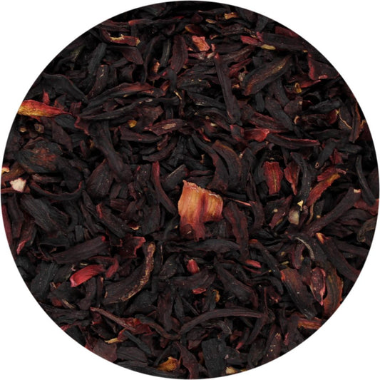 an up-close image of cut and dried hibiscus flower pieces in a circular frame.