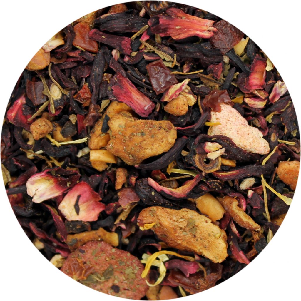 A close-up image of dried strawberries, rosehips, apple, marigold petals, peach pieces, apricot pieces, citrus peel, raisin, elderberry, pineapple, and hibiscus flowers in a circular frame