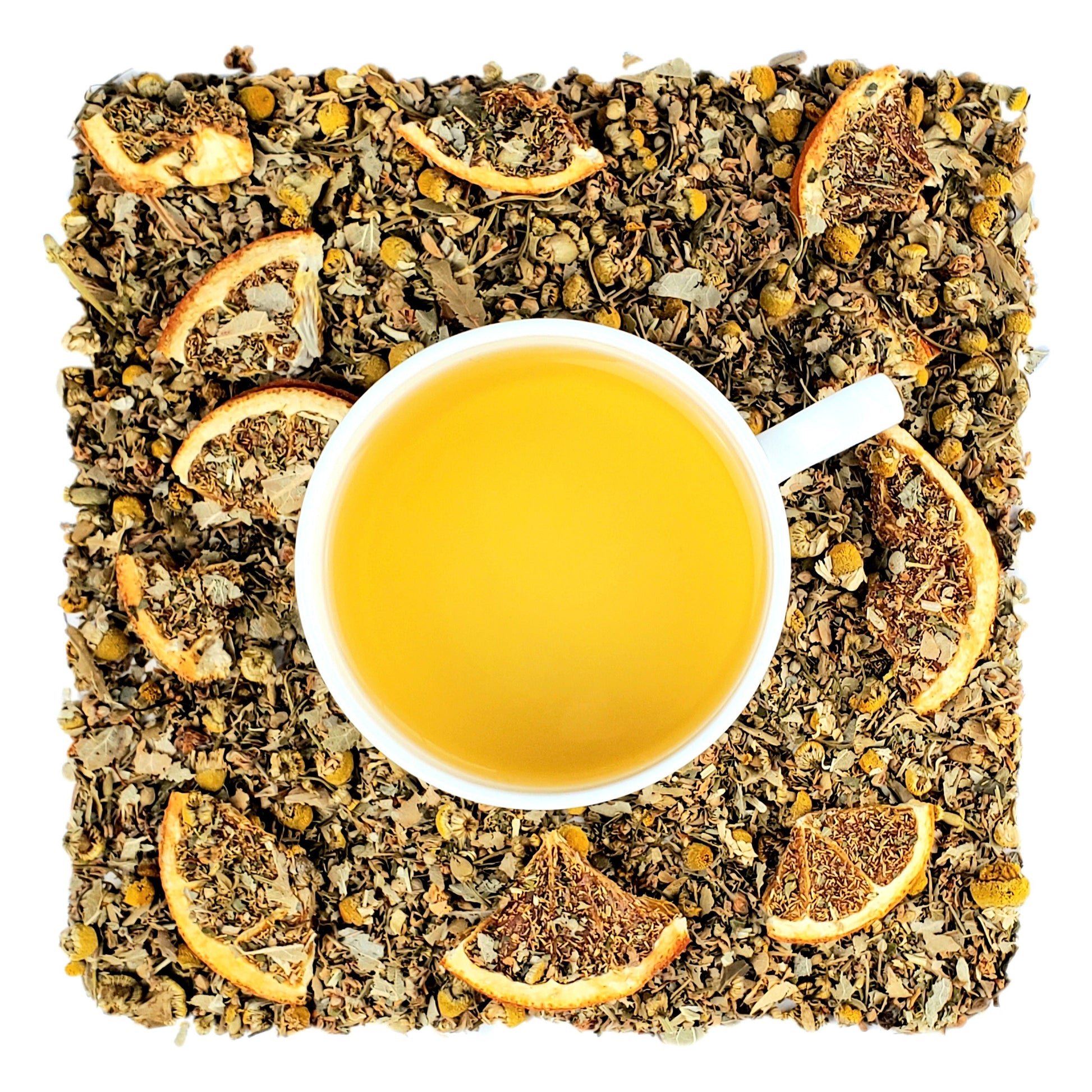 An overhead image of dried Chamomile flowers and citrus slices with a white teacup in the center. The teacup is filled with a yellow liquid of steeped Calm Chamomile Citrus tea