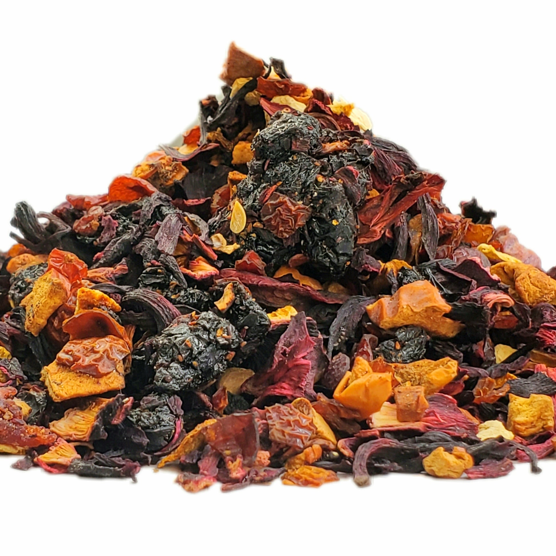A close-up image of dried berries, rosehips, and hibiscus, indicating the ingredients of the tea blend.