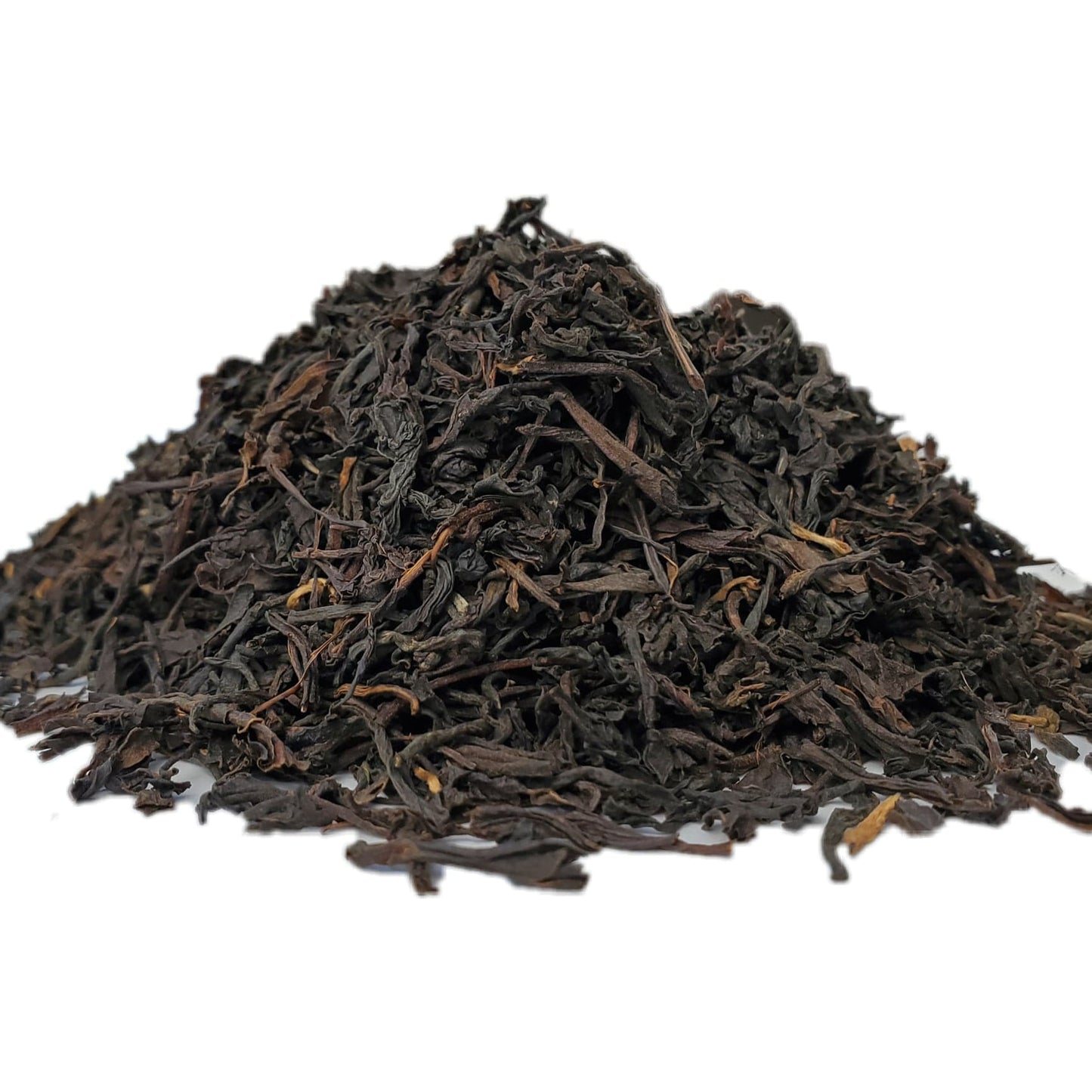 a close-up image of dried black tea leaves.