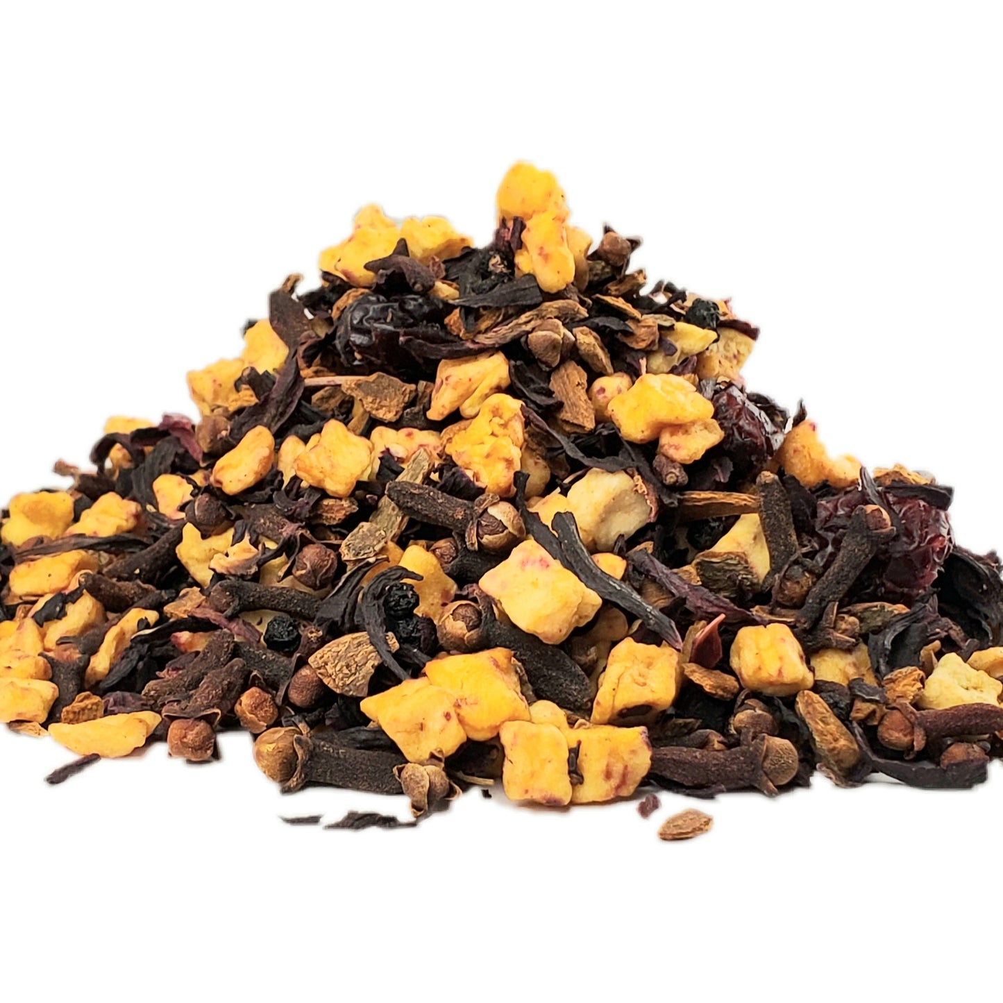 A close-up image of a pile of dried apple pieces, cloves, cinnamon, dried cranberries, hibiscus, and dried elderberries.